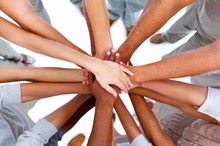image of multicultural hands together in a circle